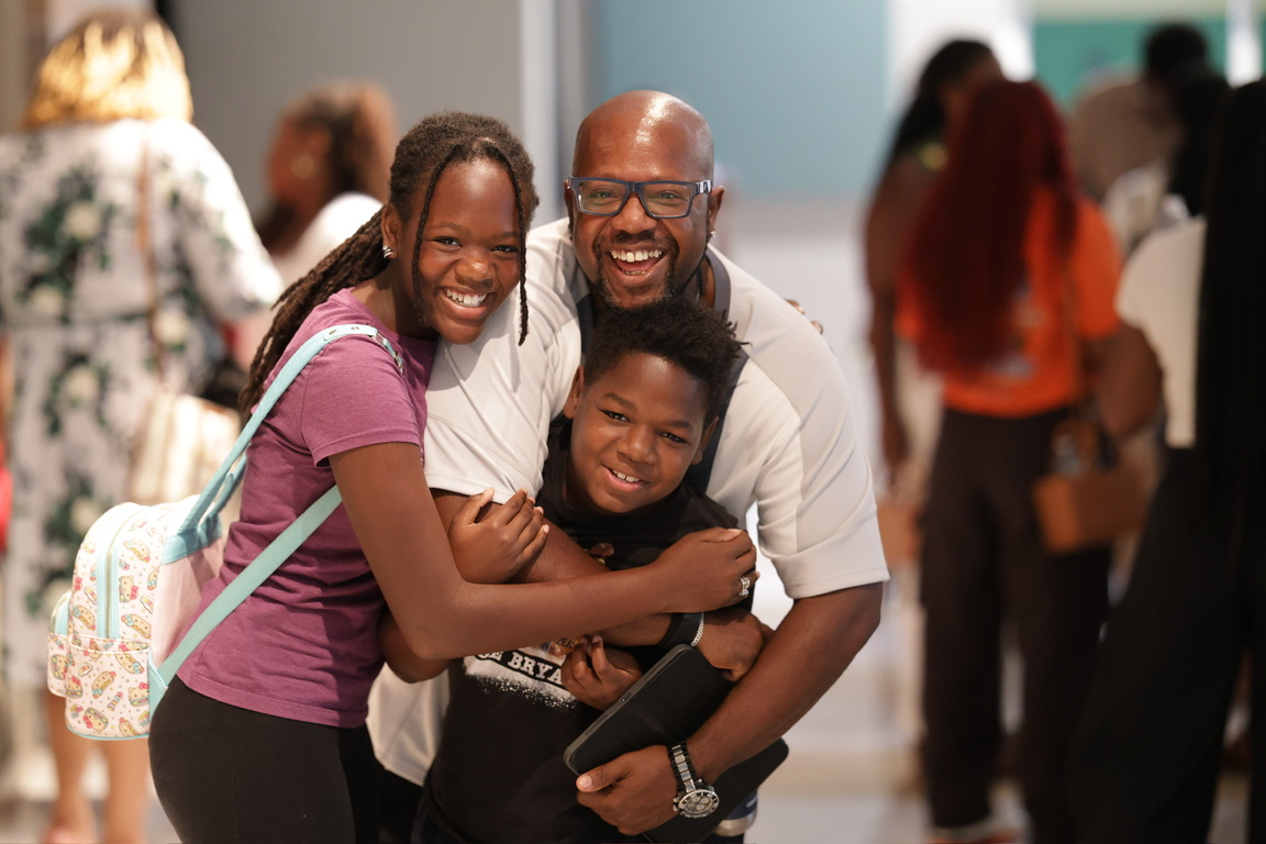 Parents worshiping with confidence at Vive City Church
